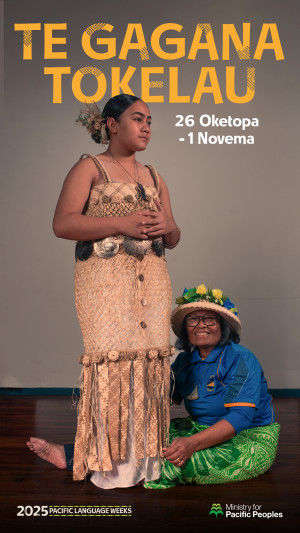 A person is standing in traditional dress looking to the right of the camera. Another person is sitting on the ground smiling as she fixes the bottom of the other person's dress.  Text says 26 Oketopa - 1 Novema. Te Gagana Tokelau. The image features small 2025 Pacific Language Weeks and Ministry for Pacific Peoples logos.